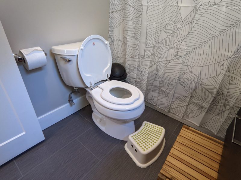 Toilet with integrated child seat.
